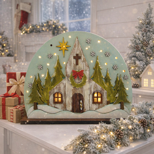 Lighted layered wood Church Christmas shelf sitter featuring a snowy winter scene, glowing windows, and embedded LED lights. Perfect rustic holiday décor for mantels, entry tables, and faith inspired Christmas displays. Handmade and beautifully detailed.