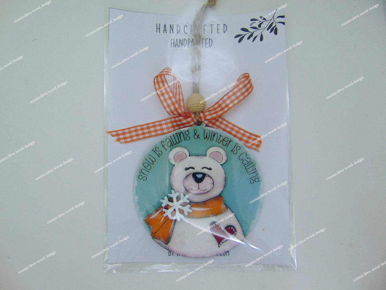 Find the perfect hand-painted polar bear Christmas ornament. Made from 3mm birchwood, this layered winter keepsake is ideal for holiday gifting and whimsical tree decor.