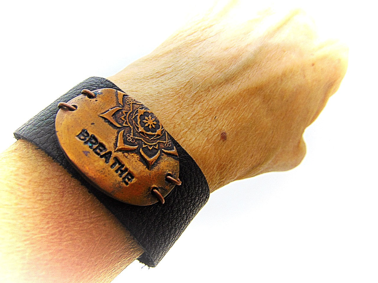 Handcrafted inspirational Yoga black deer leather bracelet with solid copper mandala tag with the word “breathe”. Motivational messages and words inspire positive energy in your life.  I put my heart and soul into every piece I create, which results in high quality workmanship and all my jewelry items are carefully handcrafted.