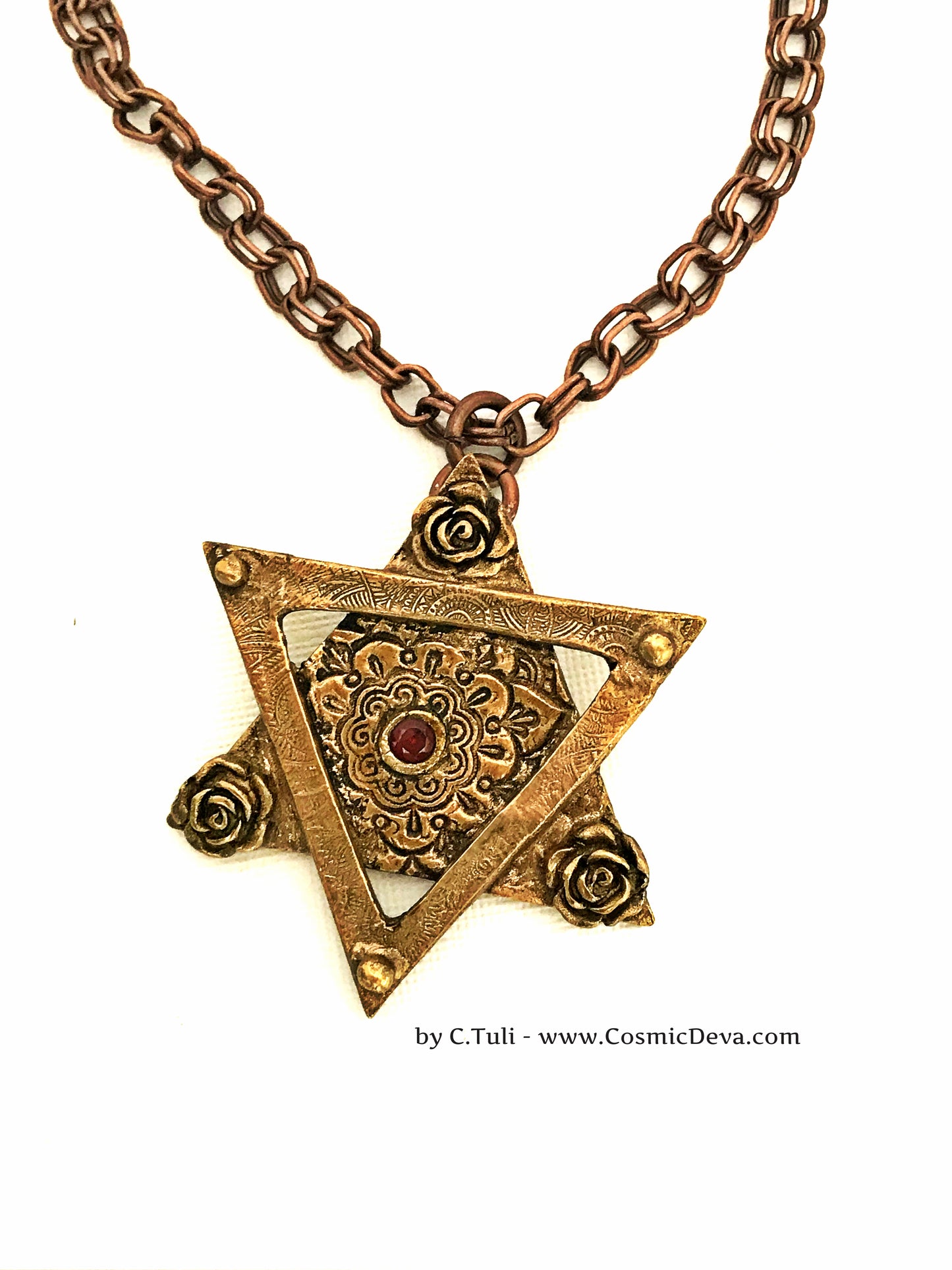 Be the star of any Bat Mitzvah with this exquisite Star of David Necklace! Crafted with an original hand-sculpted bronze design and featuring a red lab-grown garnet hessonite stone, this unique Magen David pendant will add a touch of elegance and tradition to your special day. CosmicDeva