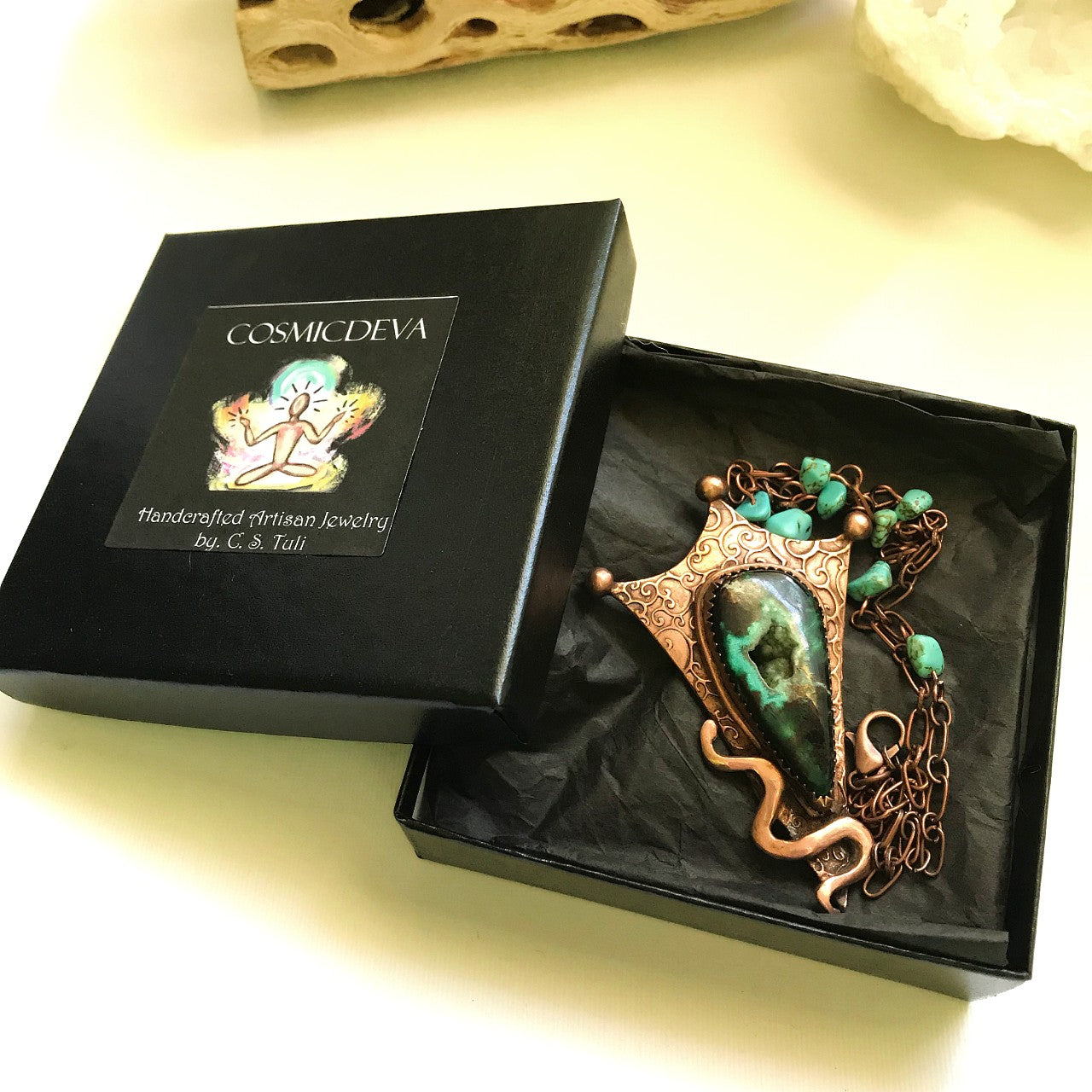 Botryoidal Chrysocolla Copper Snake Pendant Necklace This unique Chrysocolla with Malachite and traces of cuprite gemstone is nestled amidst a complete hand sculptured triangle pendant with a little snake winding up in rich and warm glowing copper and has beautiful swirl texture. This rustic copper statement necklace suspends from a copper chain with natural turquoise beads. The copper jewelry piece was oxidized for a deep warm finish. - CosmicDeva