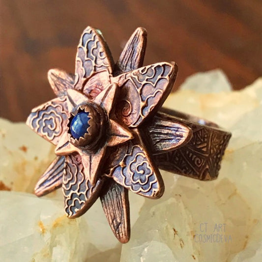 Lapis Lazuli Flower Ring,  Boho Ring, Copper Size 7 Ring. Cute flower solid handcrafted copper ring with a natural dark blue Lapis Lazuli gemstone in the center. The copper ring was oxidized to bring out the beautiful texture and give it an antique look. This ring is sealed with varnish. - CosmicDeva