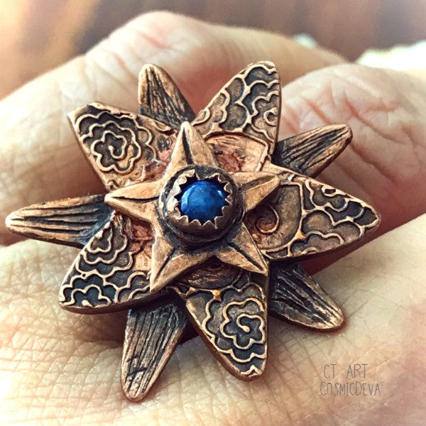 Lapis Lazuli Flower Ring,  Boho Ring, Copper Size 7 Ring. Cute flower solid handcrafted copper ring with a natural dark blue Lapis Lazuli gemstone in the center. The copper ring was oxidized to bring out the beautiful texture and give it an antique look. This ring is sealed with varnish. - CosmicDeva
