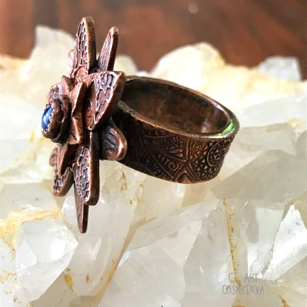 Lapis Lazuli Flower Ring,  Boho Ring, Copper Size 7 Ring . Cute flower solid handcrafted copper ring with a natural dark blue Lapis Lazuli gemstone in the center. The copper ring was oxidized to bring out the beautiful texture and give it an antique look. This ring is sealed with varnish.- CosmicDeva