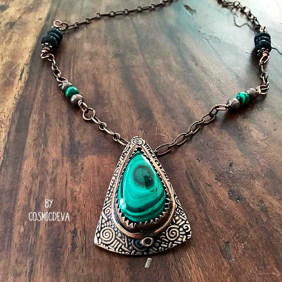 Wrap yourself in the irresistible beauty of nature with our Malachite Pendant Necklace. Handcrafted from pure copper and showcasing a stunning malachite gemstone cabochon, this gorgeous necklace is sure to be a conversation starter. Accented with malachite, volcanic rock, and copper beads- CosmicDeva