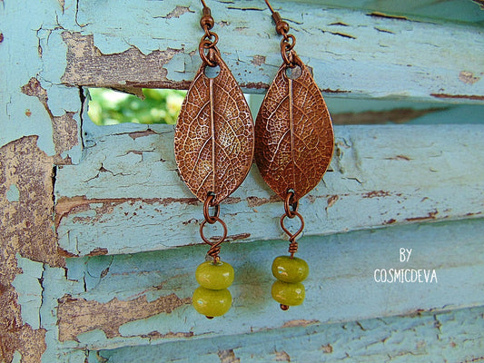 Lovely uniquely handcrafted sage leaf copper earrings featuring apple green dyed jade stone gemstone beads. These botanical copper earrings are made of high-quality materials with attention to details. The metal components were made by me: leaf earrings were crafted from solid copper, uniquely textured and carved and polished to bring out the highlights. 