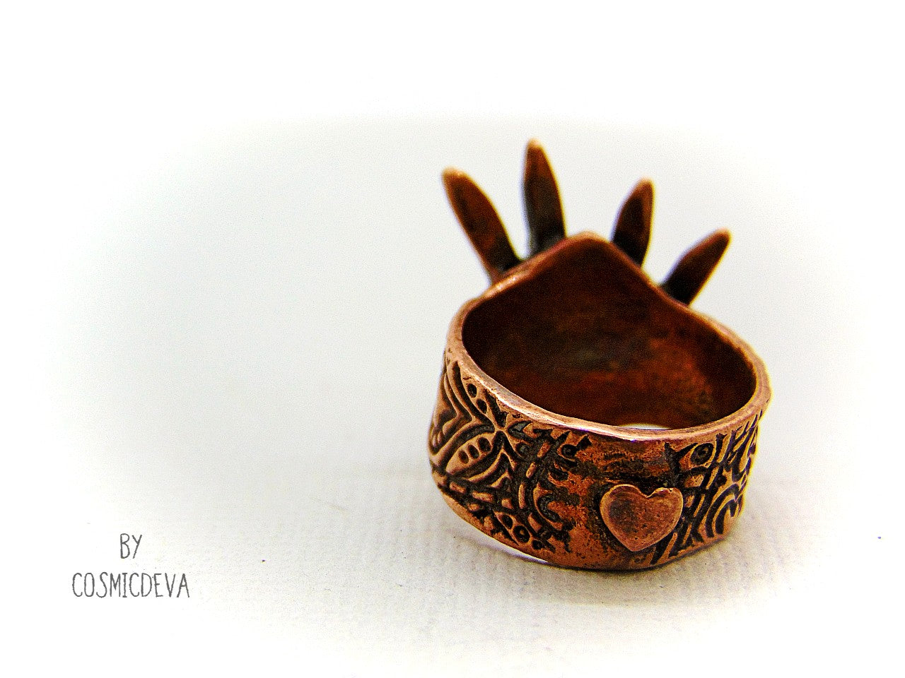 Cute one of a kind handmade unique bunny love Ring made of copper. This lovely ring features two snuggled bunny heads with a little heart in the middle. The ring shank has a beautiful texture and is decorated with another heart on the back side.