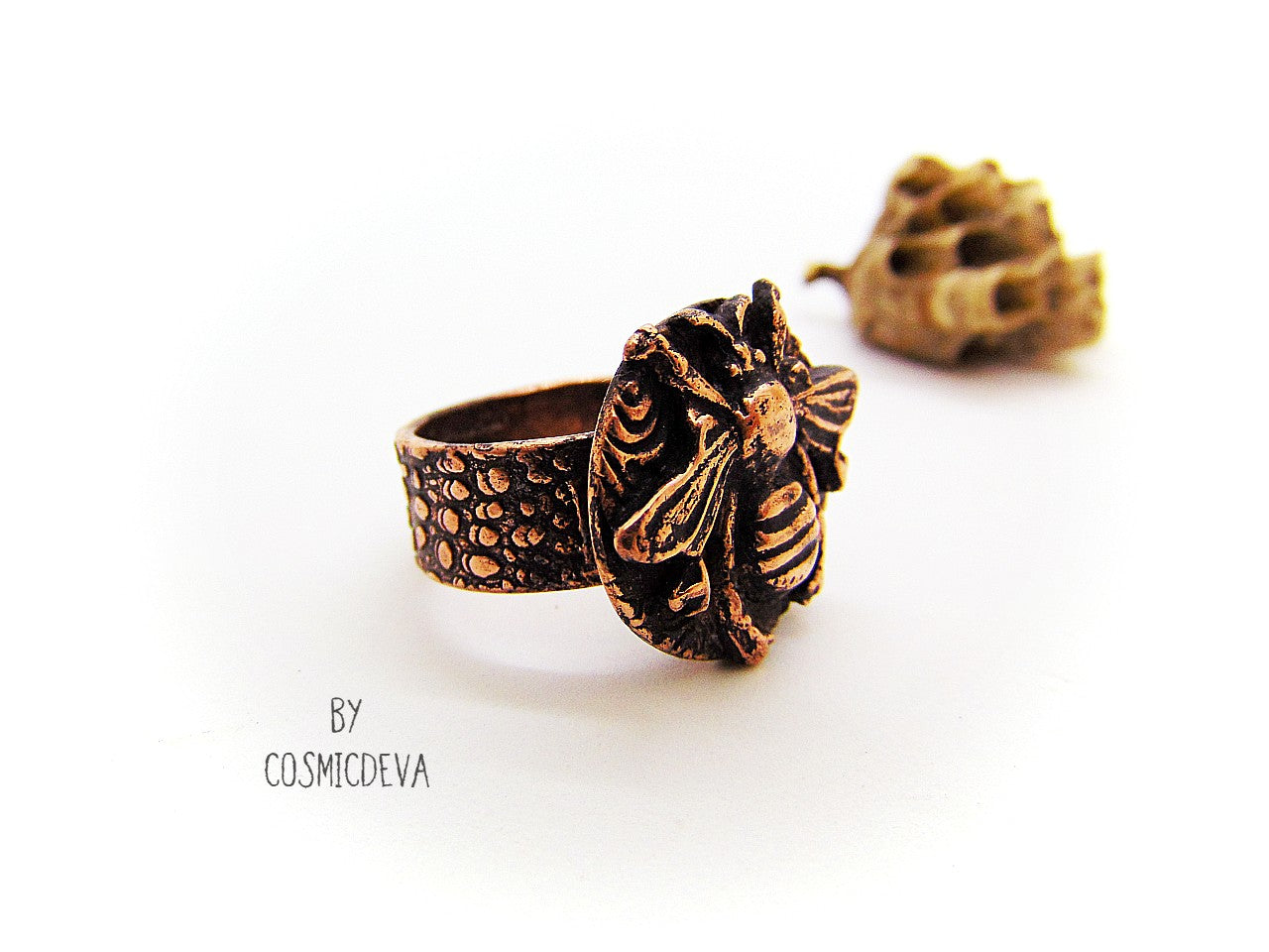 Handmade queen bee goddess, honey bee ring made of solid copper. The ring shank has a beautiful texture and has the cosmicdeva logo inside.