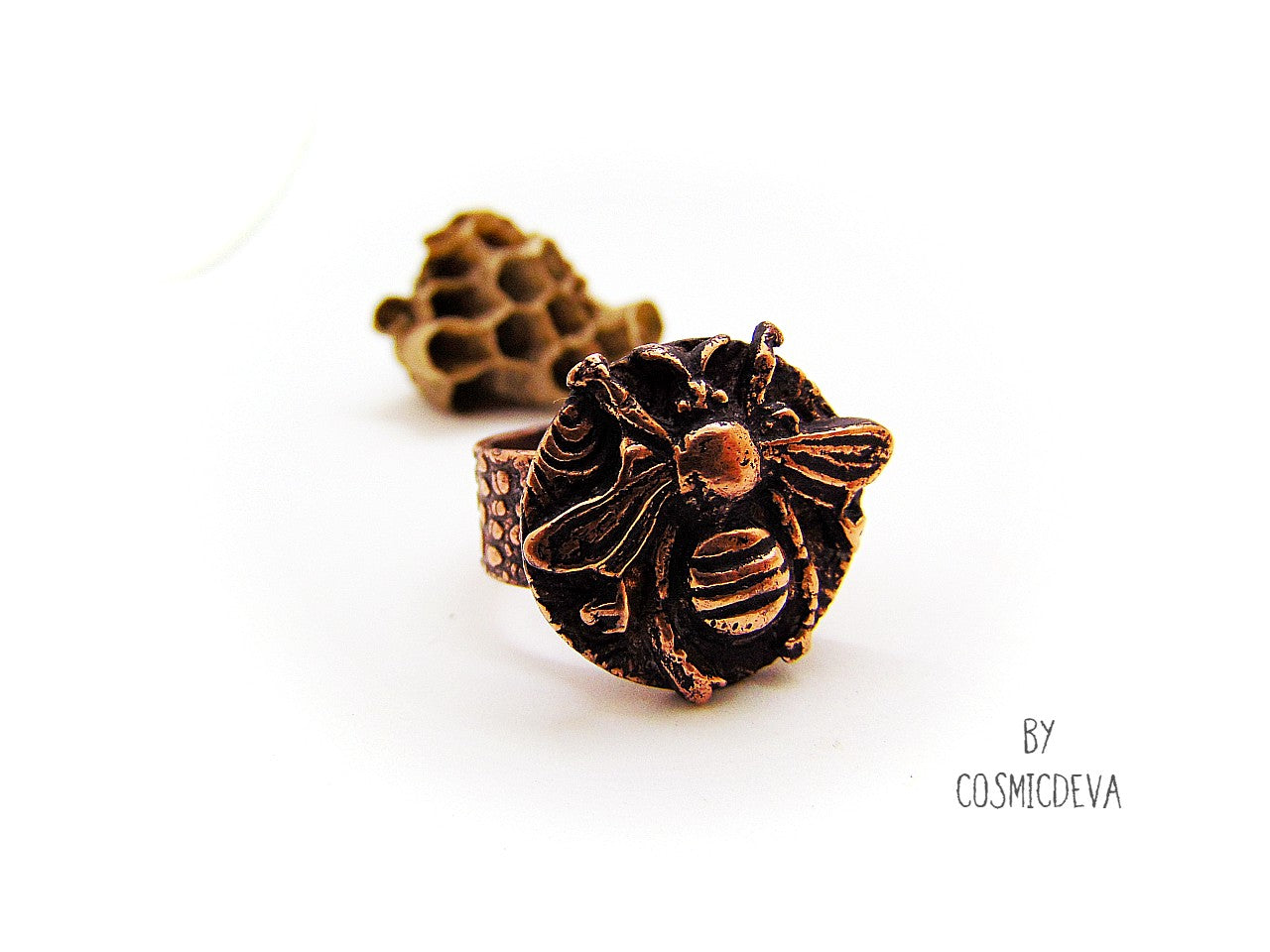 Handmade queen bee goddess, honey bee ring made of solid copper. The ring shank has a beautiful texture and has the cosmicdeva logo inside.