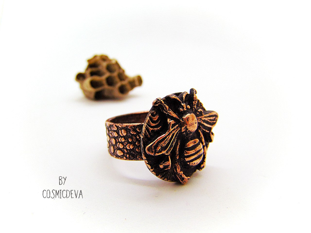 Handmade queen bee goddess, honey bee ring made of solid copper. The ring shank has a beautiful texture and has the cosmicdeva logo inside.