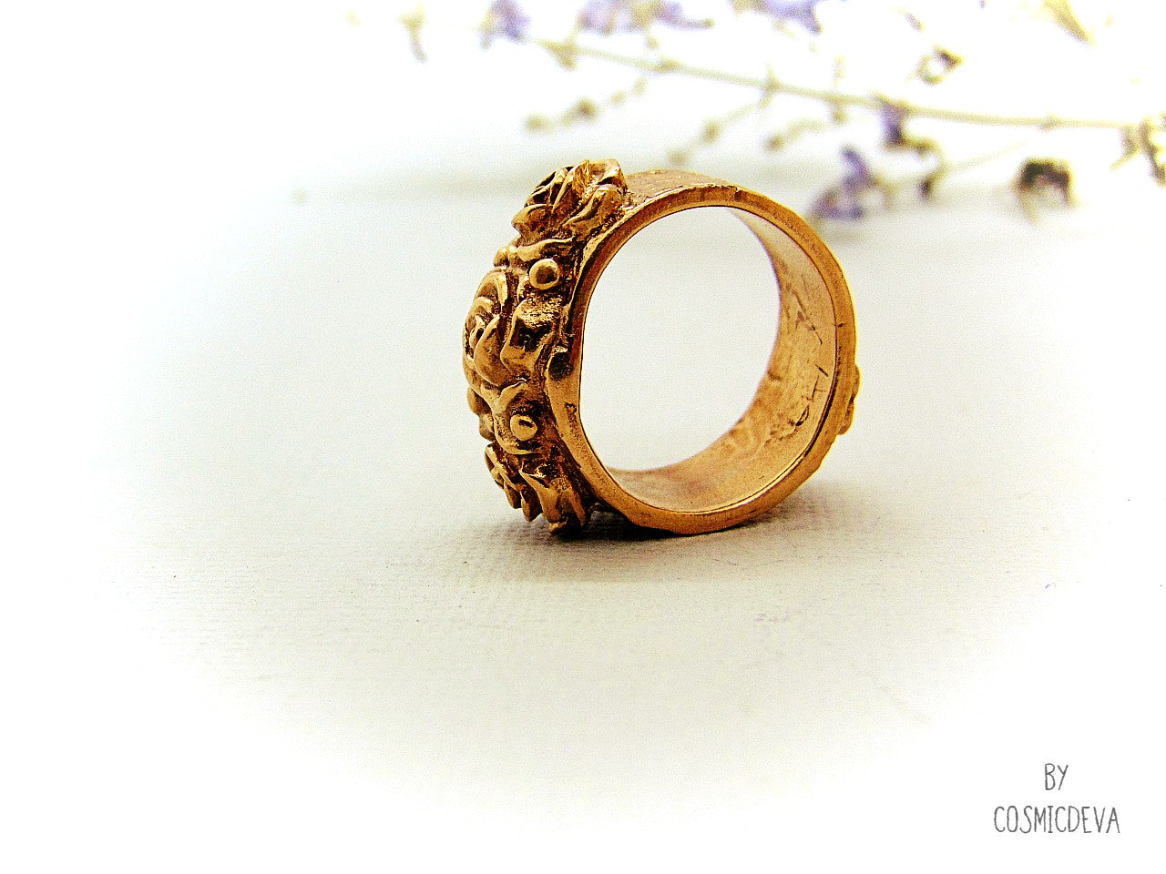 Handmade and hand formed unique organic solid gold bronze roman style ring featuring three roses with two hearts 💕 on the bottom side. This ring is sealed with Renaissance wax and comes with a complimentary polishing cloth. All my jewelry is packed in a beautiful gift box.