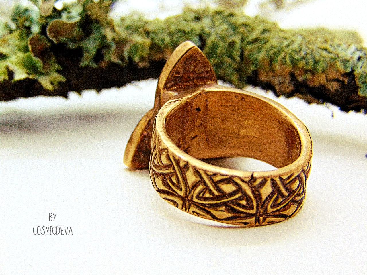 Handcrafted trinity knot ring made of solid gold bronze. The triquetra symbol was adopted by early Irish Christians in the 4th century as a symbol of the Holy Trinity