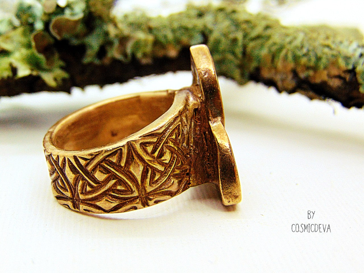 Handcrafted trinity knot ring made of solid gold bronze. The triquetra symbol was adopted by early Irish Christians in the 4th century as a symbol of the Holy Trinity