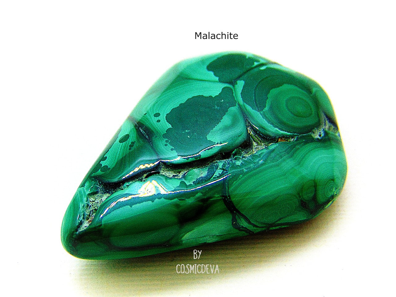 Outstanding and beautiful high quality polished botryoidal green malachite gemstone cabochon. Malachite is a copper ore mineral and has the reputation to protect against the evil eye, witchcraft and evil spirits. This beautiful malachite stone would be a great addition to you Chrystal collection, Chrystal healing or even for jewelry making.